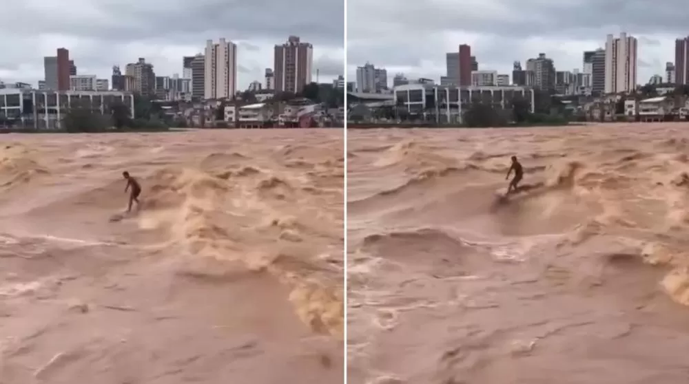 Homem é flagrado surfando no Rio Doce em meio a alerta de chuvas intensas